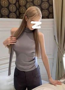 Sleek Grey Sleeveless Turtleneck Top