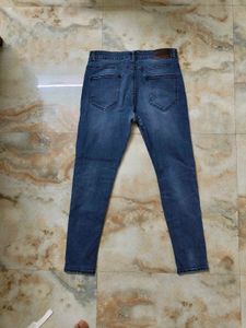 Distressed Denim Jeans
