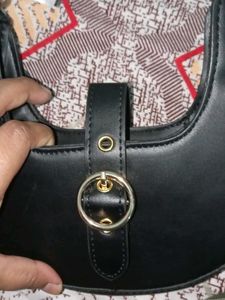 Chic Black Hobo Bag with Gold Accent