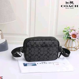 COACH* *GRAHAM CROSSBODY IN SIGNATURE CANVAS