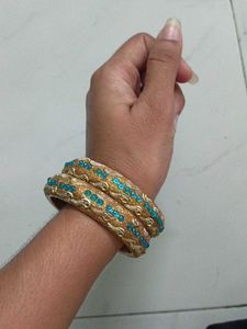 Exquisite Golden Bangles with Blue Stones