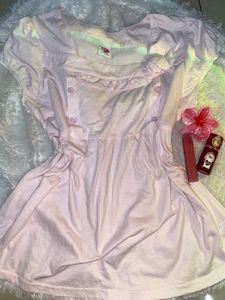 A cute pink baby doll top