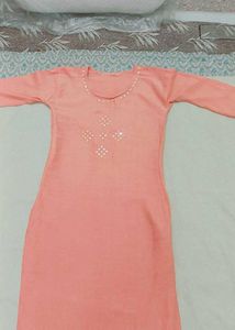 Elegant Peach Kurta with Embellishments