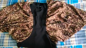 Chic Black Top with Animal Print Sleeves