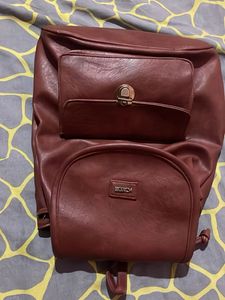 Stylish Brown Backpack Button Damaged