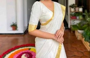 Elegant White & Gold Saree