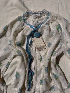 White Floral Blouse with Blue Ribbon