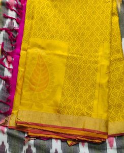 Vibrant Yellow Saree with Intricate Pattern