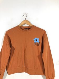 zudio Orange Floral Graphic Sweatshirt
