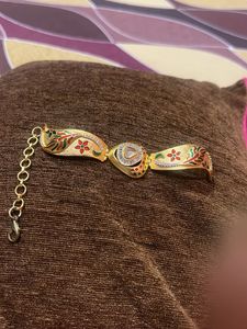 Elegant Gold Bracelet with Stones