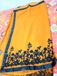 Vibrant Orange Saree with Floral Border