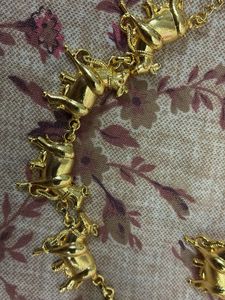 Gold-tone Nandi bell Necklace and Earring Set