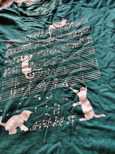 Teal graphic T-shirt in Size S