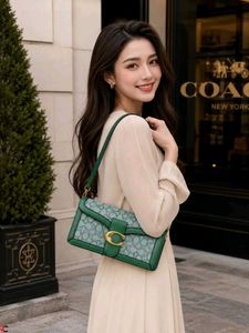 COACH*  *TABBY SHOULDER BAG IN SIGNATURE CANVAS*