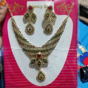 fancy set of necklace and pair of earring