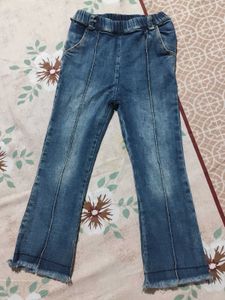 Blue Denim Flare Jeans with Raw Hem