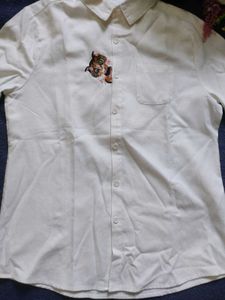 Chic White Button-Up Shirt with Embroidered Detail