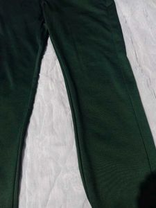fitted dark green trousers (unisex)