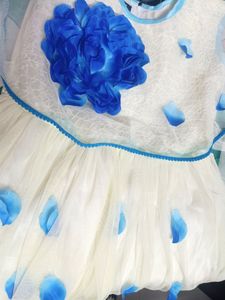 Off white and sky blue knee length frock for girls