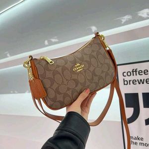 Coach Teri Slingbag