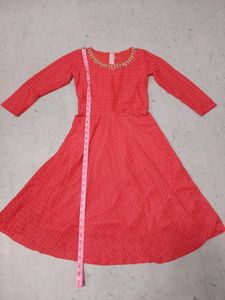 Elegant Coral Lace Gown with Embellished Neckline