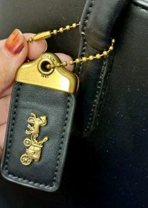 Coach Black Leather Handbag with Charm