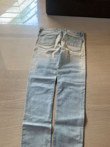 Light Wash Distressed Denim Jeans