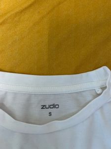 White Top with Crest Design
