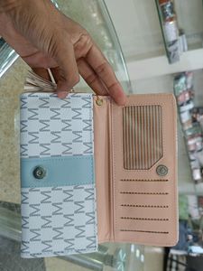 FOREVER YOUNG HAND CLUTCH