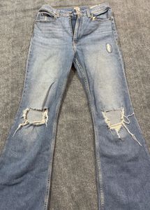 Distressed Blue Denim Jeans