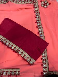 Elegant Coral Saree with Mirror Work