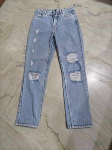 Ripped Light Wash Denim Jeans