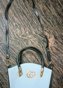 GG Blue Scatch Sling Bag.