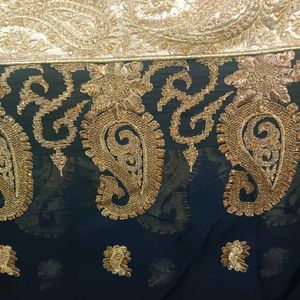 Elegant Embroidered Golden Black Heavy Saree