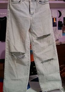 Women's Light Wash Ripped Jeans