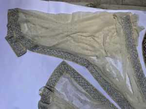 cream designer stud heavy saree