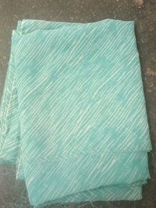 Beautiful Teal blouse material with Abstract Print