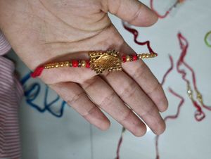 veera oxidised gold brooch rakhi