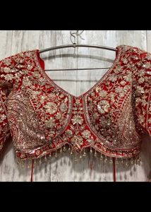 Stunning Red Embellished Lehenga Choli