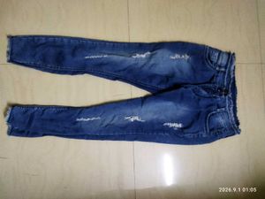 Ripped Blue Denim Jeans