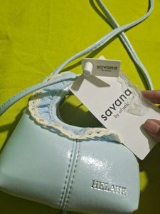 Chic Pastel Blue Ruffled Handbag