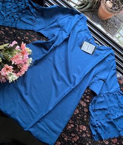 Blue top with cut work sleeves