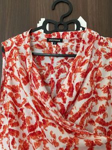 Stylish Orange &amp; White Print Sleeveless Top