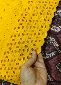 Vibrant Yellow Eyelet fabric material