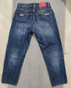 Distressed Blue Denim Jeans