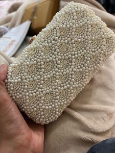 white pearl clutch