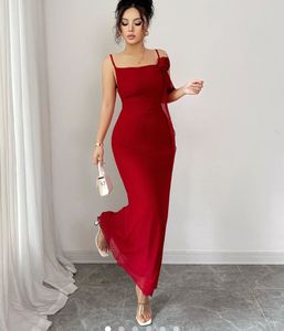 Elegant Red Evening Gown with Rose Detail