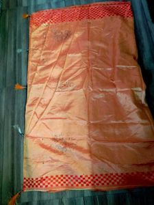 Stunning Orange Saree with Red Border