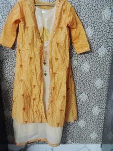 Elegant Off white colour Kurti with Shrug