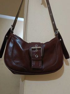 brown sling bag